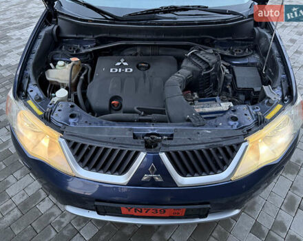 Синий Мицубиси Аутлендер, объемом двигателя 2 л и пробегом 228 тыс. км за 8888 $, фото 50 на Automoto.ua