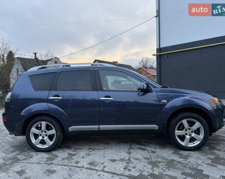 Синий Мицубиси Аутлендер, объемом двигателя 2 л и пробегом 228 тыс. км за 8888 $, фото 11 на Automoto.ua