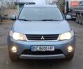 Синий Мицубиси Аутлендер, объемом двигателя 2.4 л и пробегом 264 тыс. км за 7555 $, фото 12 на Automoto.ua