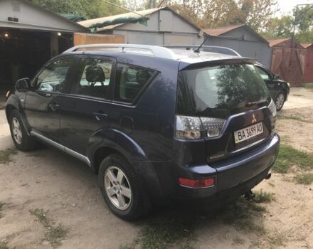 Синій Міцубісі Аутлендер, об'ємом двигуна 2.4 л та пробігом 289 тис. км за 6666 $, фото 3 на Automoto.ua