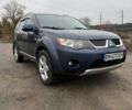 Синий Мицубиси Аутлендер, объемом двигателя 2.4 л и пробегом 211 тыс. км за 7800 $, фото 1 на Automoto.ua
