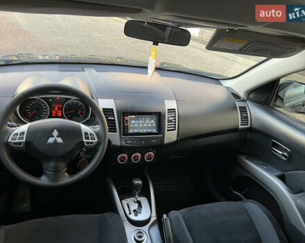 Міцубісі Аутлендер 2008 у Хусте на Automoto.ua Синій Міцубісі Аутлендер, об'ємом двигуна 2.4 л та пробігом 246 тис. км за 7950 $, фото 8 на Automoto.ua