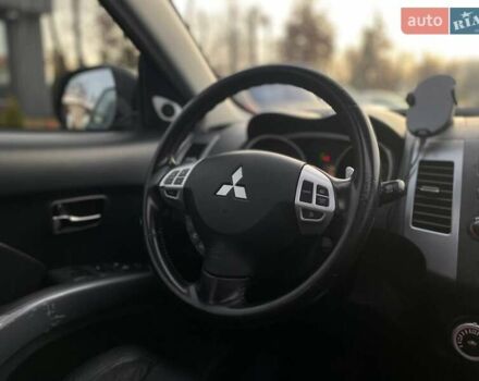 Синій Міцубісі Аутлендер, об'ємом двигуна 2.36 л та пробігом 282 тис. км за 9490 $, фото 44 на Automoto.ua