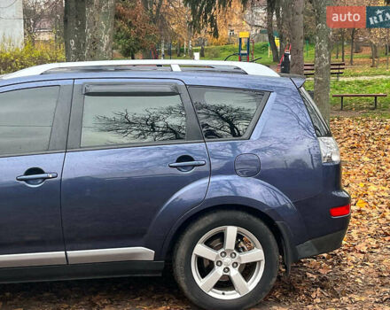 Синій Міцубісі Аутлендер, об'ємом двигуна 2.4 л та пробігом 211 тис. км за 8390 $, фото 6 на Automoto.ua