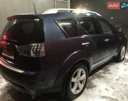 Синий Мицубиси Аутлендер, объемом двигателя 3 л и пробегом 340 тыс. км за 9555 $, фото 4 на Automoto.ua