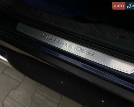 Синій Міцубісі Аутлендер, об'ємом двигуна 2.36 л та пробігом 282 тис. км за 9490 $, фото 21 на Automoto.ua