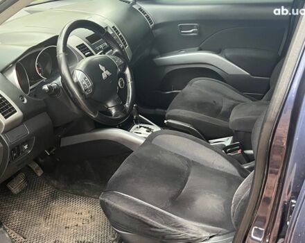 Синій Міцубісі Аутлендер, об'ємом двигуна 2.4 л та пробігом 211 тис. км за 8390 $, фото 26 на Automoto.ua