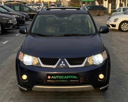 Синий Мицубиси Аутлендер, объемом двигателя 2.4 л и пробегом 282 тыс. км за 9490 $, фото 1 на Automoto.ua