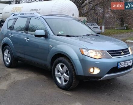 Синий Мицубиси Аутлендер, объемом двигателя 2.4 л и пробегом 264 тыс. км за 7555 $, фото 7 на Automoto.ua