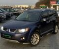 Синій Міцубісі Аутлендер, об'ємом двигуна 2.36 л та пробігом 282 тис. км за 9490 $, фото 1 на Automoto.ua