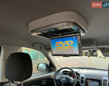 Міцубісі Аутлендер 2008 у Хусте на Automoto.ua Синій Міцубісі Аутлендер, об'ємом двигуна 2.4 л та пробігом 246 тис. км за 7950 $, фото 11 на Automoto.ua