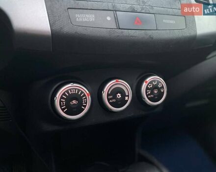 Синій Міцубісі Аутлендер, об'ємом двигуна 2.36 л та пробігом 282 тис. км за 9490 $, фото 38 на Automoto.ua