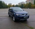 Синий Мицубиси Аутлендер, объемом двигателя 2.4 л и пробегом 153 тыс. км за 10500 $, фото 2 на Automoto.ua