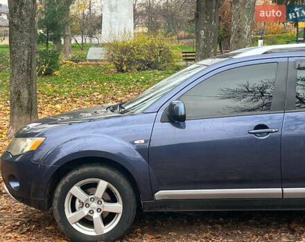 Синій Міцубісі Аутлендер, об'ємом двигуна 2.4 л та пробігом 211 тис. км за 8390 $, фото 5 на Automoto.ua