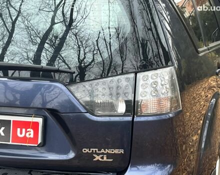 Синій Міцубісі Аутлендер, об'ємом двигуна 2.4 л та пробігом 211 тис. км за 8390 $, фото 10 на Automoto.ua