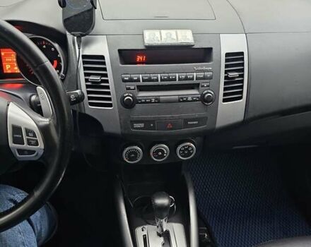 Синій Міцубісі Аутлендер, об'ємом двигуна 2.4 л та пробігом 282 тис. км за 10500 $, фото 3 на Automoto.ua