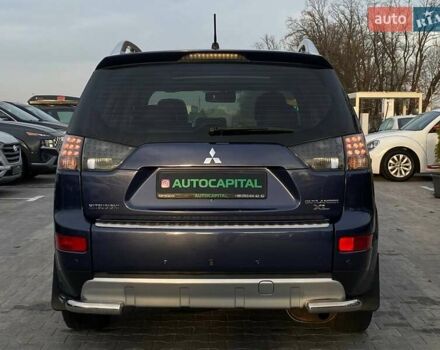 Синій Міцубісі Аутлендер, об'ємом двигуна 2.36 л та пробігом 282 тис. км за 9490 $, фото 8 на Automoto.ua