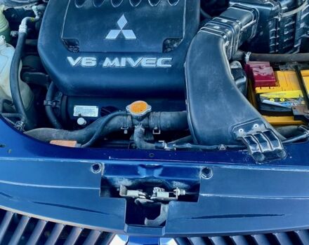 Синий Мицубиси Аутлендер, объемом двигателя 3 л и пробегом 228 тыс. км за 9000 $, фото 10 на Automoto.ua