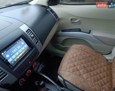 Синий Мицубиси Аутлендер, объемом двигателя 2.4 л и пробегом 264 тыс. км за 7555 $, фото 26 на Automoto.ua