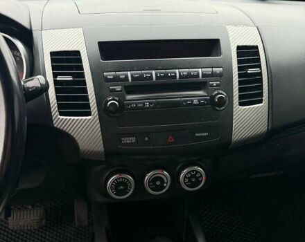 Синий Мицубиси Аутлендер, объемом двигателя 2.4 л и пробегом 211 тыс. км за 7800 $, фото 18 на Automoto.ua