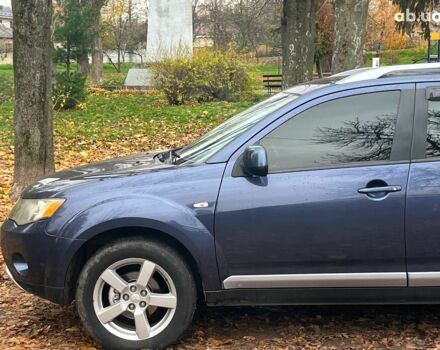 Синій Міцубісі Аутлендер, об'ємом двигуна 2.4 л та пробігом 211 тис. км за 8390 $, фото 5 на Automoto.ua