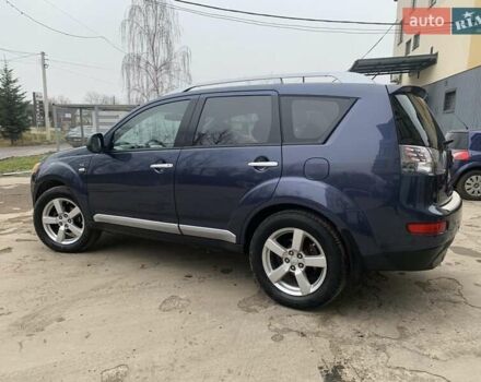 Синий Мицубиси Аутлендер, объемом двигателя 3 л и пробегом 383 тыс. км за 9000 $, фото 2 на Automoto.ua