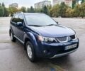 Синий Мицубиси Аутлендер, объемом двигателя 2.4 л и пробегом 153 тыс. км за 10500 $, фото 1 на Automoto.ua