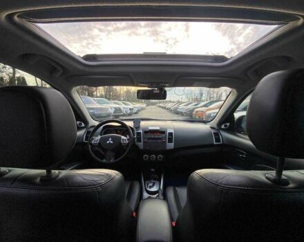 Синий Мицубиси Аутлендер, объемом двигателя 2.4 л и пробегом 282 тыс. км за 9490 $, фото 23 на Automoto.ua