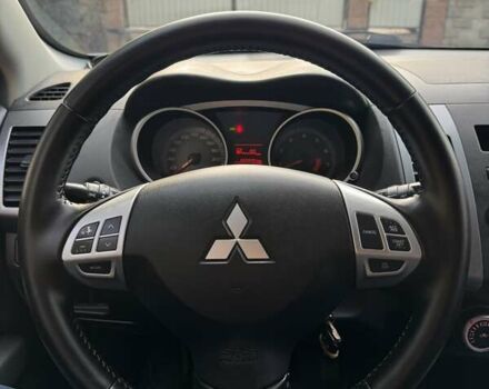 Синий Мицубиси Аутлендер, объемом двигателя 2.36 л и пробегом 223 тыс. км за 8650 $, фото 17 на Automoto.ua