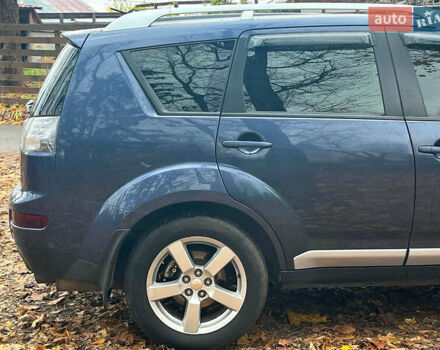 Синій Міцубісі Аутлендер, об'ємом двигуна 2.4 л та пробігом 211 тис. км за 8390 $, фото 12 на Automoto.ua