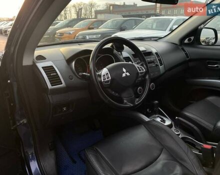 Синій Міцубісі Аутлендер, об'ємом двигуна 2.36 л та пробігом 282 тис. км за 9490 $, фото 20 на Automoto.ua