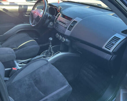 Синий Мицубиси Аутлендер, объемом двигателя 2 л и пробегом 263 тыс. км за 8900 $, фото 23 на Automoto.ua