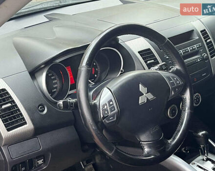 Синій Міцубісі Аутлендер, об'ємом двигуна 2.4 л та пробігом 211 тис. км за 8390 $, фото 28 на Automoto.ua