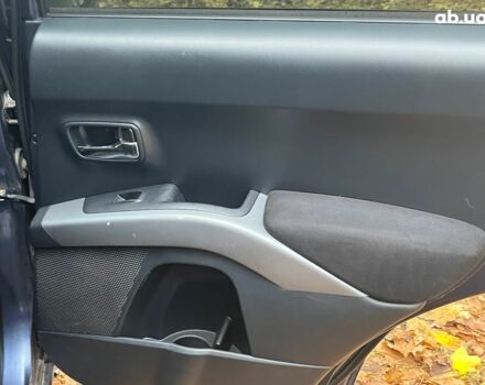 Синій Міцубісі Аутлендер, об'ємом двигуна 2.4 л та пробігом 211 тис. км за 8390 $, фото 22 на Automoto.ua