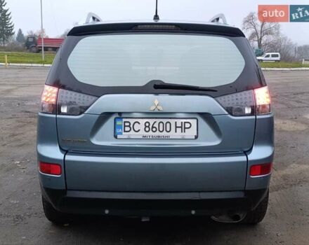 Синий Мицубиси Аутлендер, объемом двигателя 2.4 л и пробегом 264 тыс. км за 7555 $, фото 11 на Automoto.ua