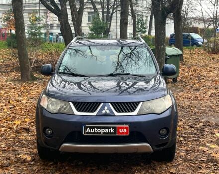Синій Міцубісі Аутлендер, об'ємом двигуна 2.4 л та пробігом 211 тис. км за 8390 $, фото 1 на Automoto.ua