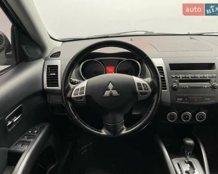 Синій Міцубісі Аутлендер, об'ємом двигуна 2.4 л та пробігом 126 тис. км за 10438 $, фото 10 на Automoto.ua
