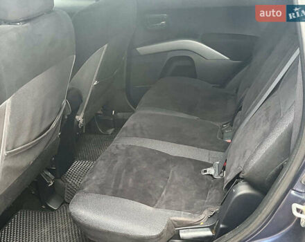 Синій Міцубісі Аутлендер, об'ємом двигуна 2.4 л та пробігом 211 тис. км за 8390 $, фото 24 на Automoto.ua