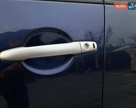 Синій Міцубісі Аутлендер, об'ємом двигуна 2.36 л та пробігом 282 тис. км за 9490 $, фото 15 на Automoto.ua