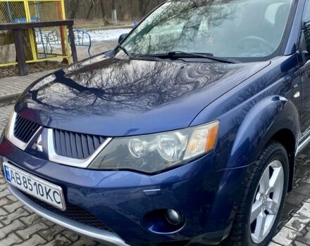 Синий Мицубиси Аутлендер, объемом двигателя 3 л и пробегом 228 тыс. км за 9000 $, фото 4 на Automoto.ua