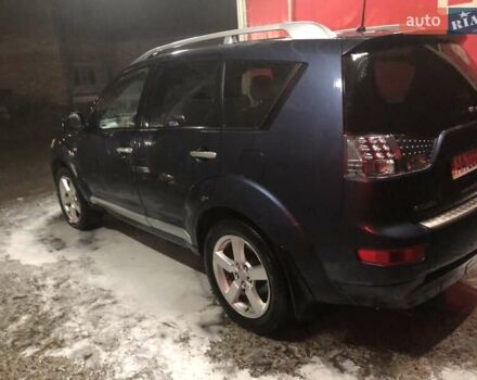 Синий Мицубиси Аутлендер, объемом двигателя 3 л и пробегом 340 тыс. км за 9555 $, фото 7 на Automoto.ua