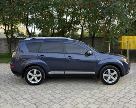 Синий Мицубиси Аутлендер, объемом двигателя 2.36 л и пробегом 223 тыс. км за 8650 $, фото 3 на Automoto.ua