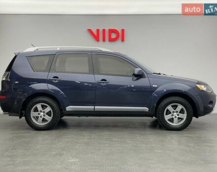 Синій Міцубісі Аутлендер, об'ємом двигуна 2.4 л та пробігом 126 тис. км за 10438 $, фото 3 на Automoto.ua