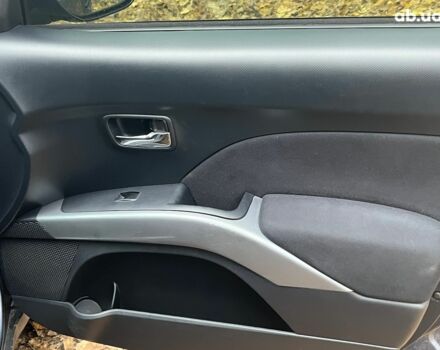 Синій Міцубісі Аутлендер, об'ємом двигуна 2.4 л та пробігом 211 тис. км за 8390 $, фото 14 на Automoto.ua