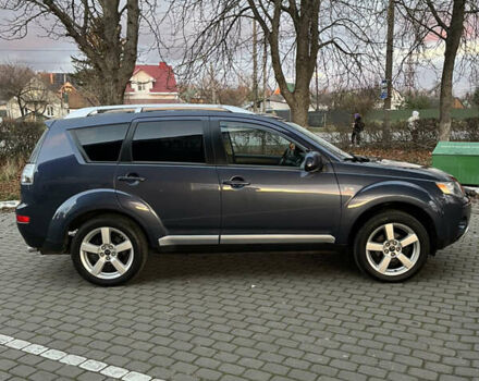 Синий Мицубиси Аутлендер, объемом двигателя 2 л и пробегом 263 тыс. км за 8900 $, фото 4 на Automoto.ua