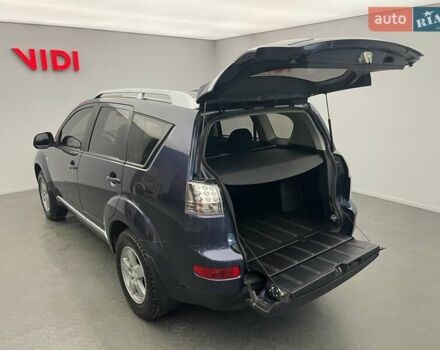 Синій Міцубісі Аутлендер, об'ємом двигуна 2.4 л та пробігом 126 тис. км за 10438 $, фото 6 на Automoto.ua