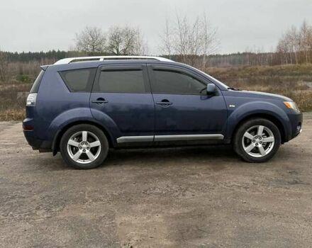 Синий Мицубиси Аутлендер, объемом двигателя 2.4 л и пробегом 211 тыс. км за 7800 $, фото 24 на Automoto.ua