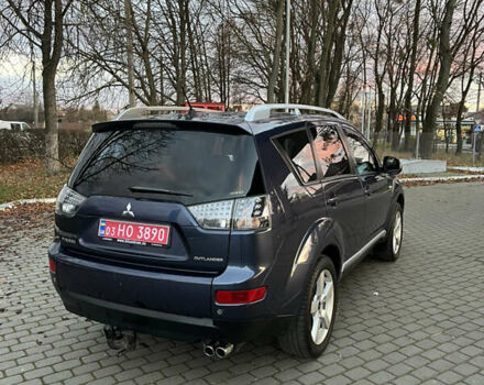 Синий Мицубиси Аутлендер, объемом двигателя 2 л и пробегом 263 тыс. км за 8900 $, фото 5 на Automoto.ua
