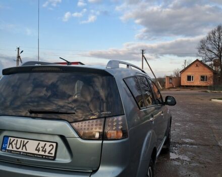 Синий Мицубиси Аутлендер, объемом двигателя 2 л и пробегом 600 тыс. км за 3500 $, фото 5 на Automoto.ua