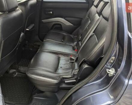 Синий Мицубиси Аутлендер, объемом двигателя 3 л и пробегом 382 тыс. км за 8200 $, фото 1 на Automoto.ua